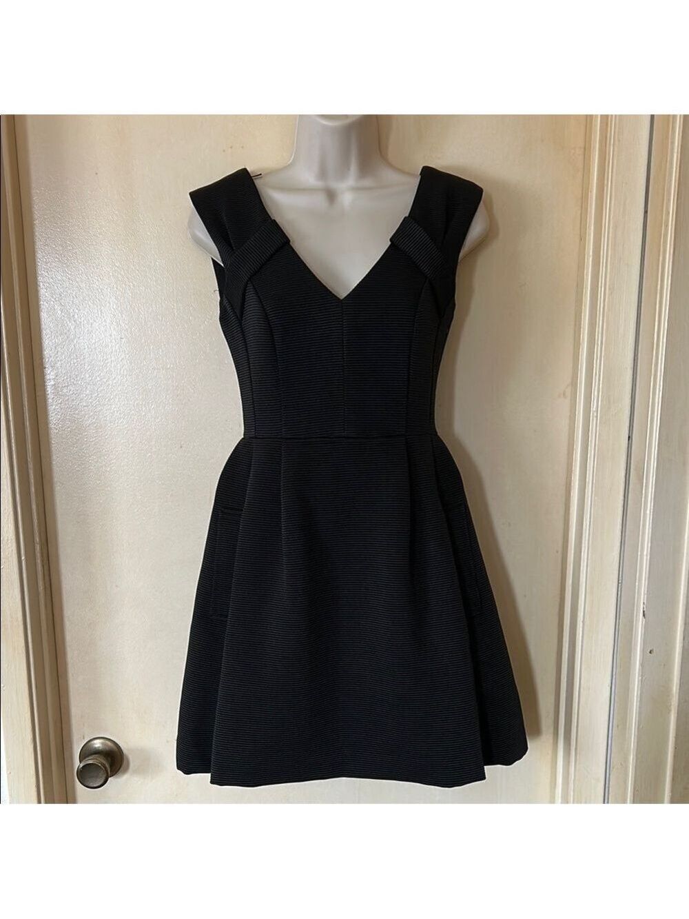 Nanette Lepore black cocktail dress with pockets size 0